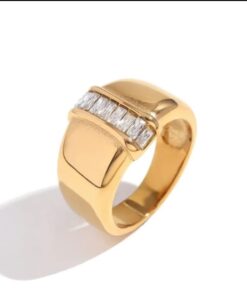 Gold Ring With A Diamond Set In The Center