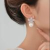 Silver pearl studs