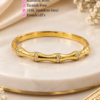 Alt Text: Stainless steel handcuff bracelet for women